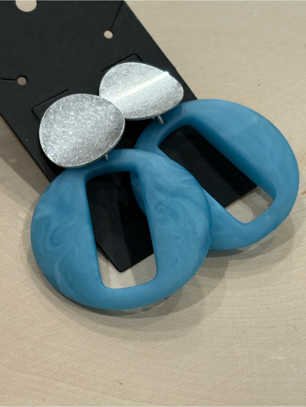 Bright blue cutout circle with silver circle post dangle earrings New on card